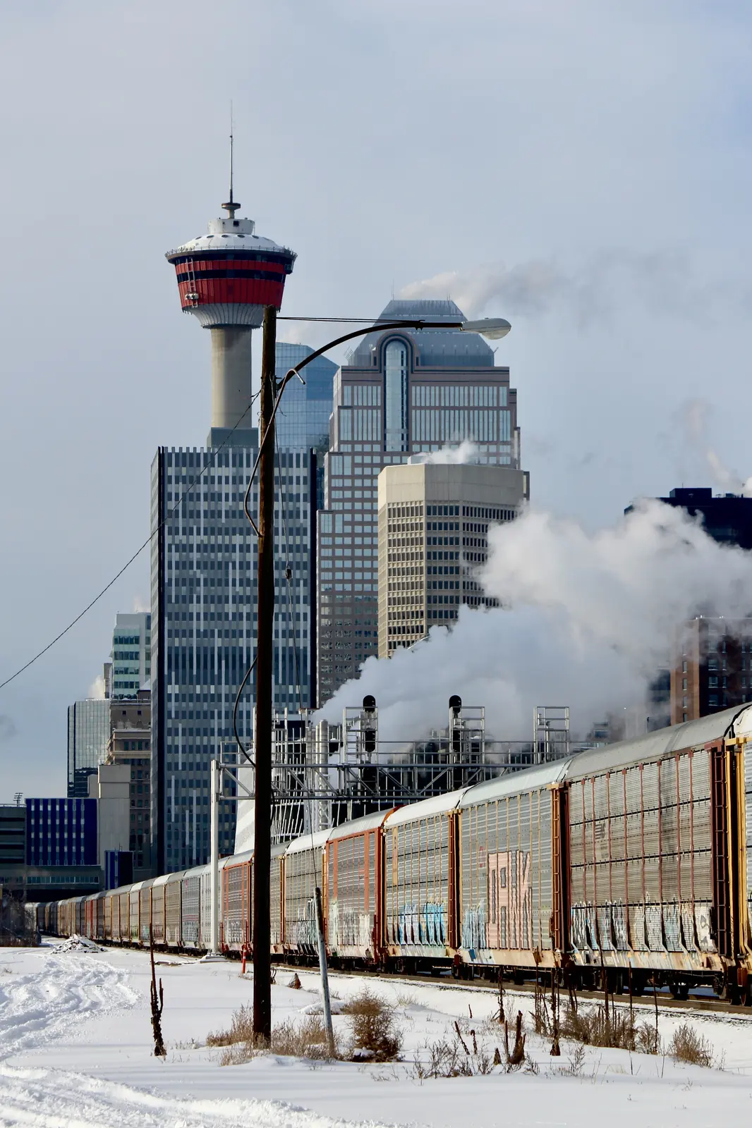 Steam rising between city buildings