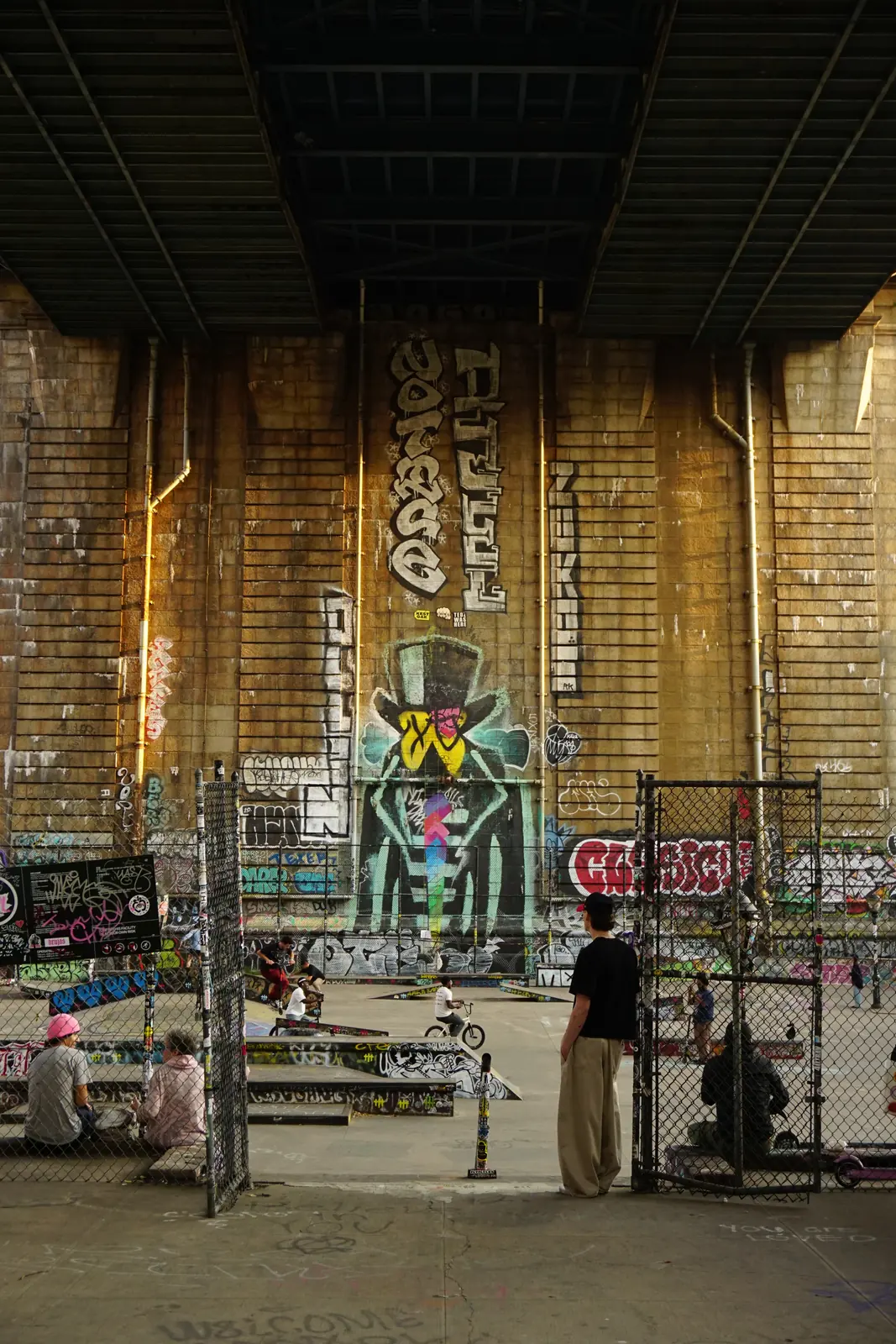 Graffiti covering the walls of a narrow alley