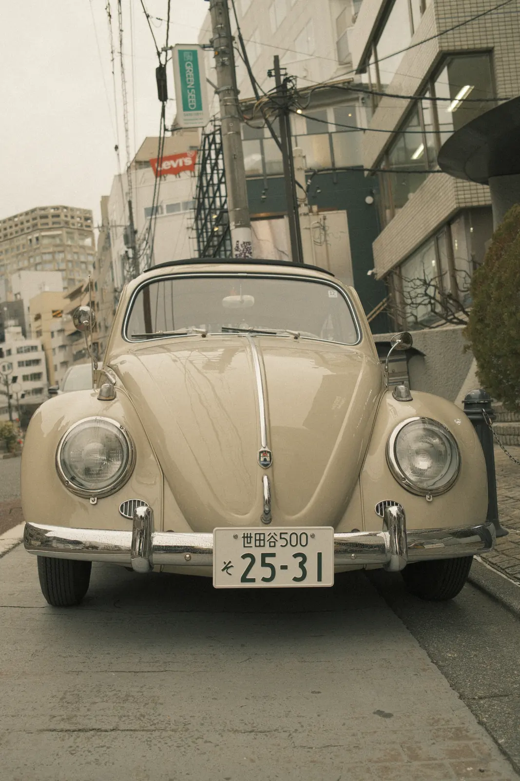 Vintage Volkswagen Beetle parked in Japan