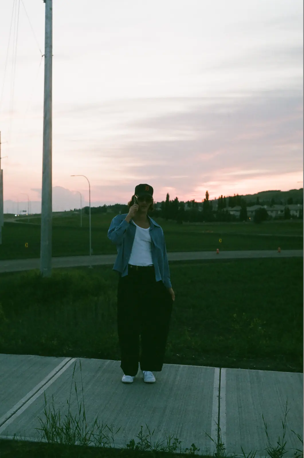Portrait in a field at sunset